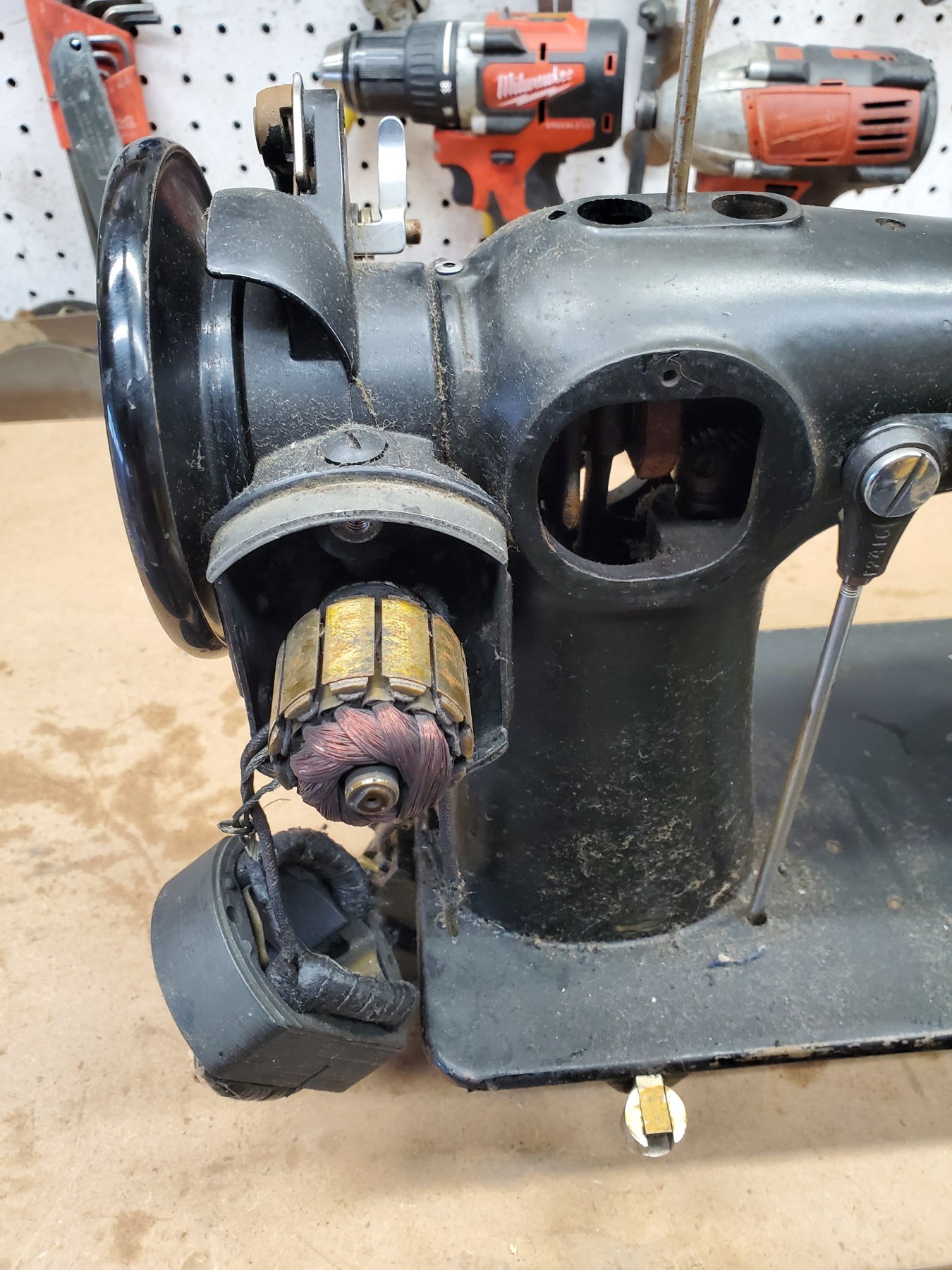 A closer look at a disassembled motor and its wiring.